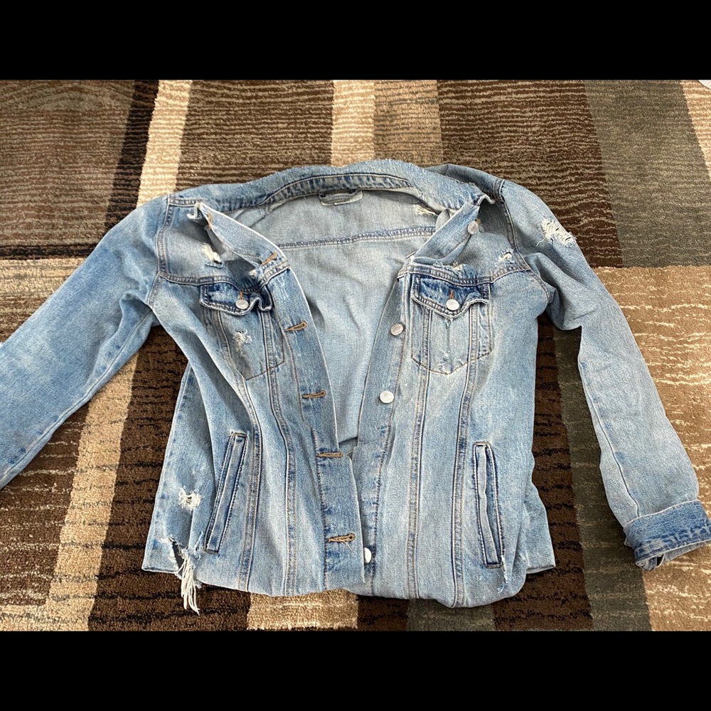 Ripped up Jean Jacket